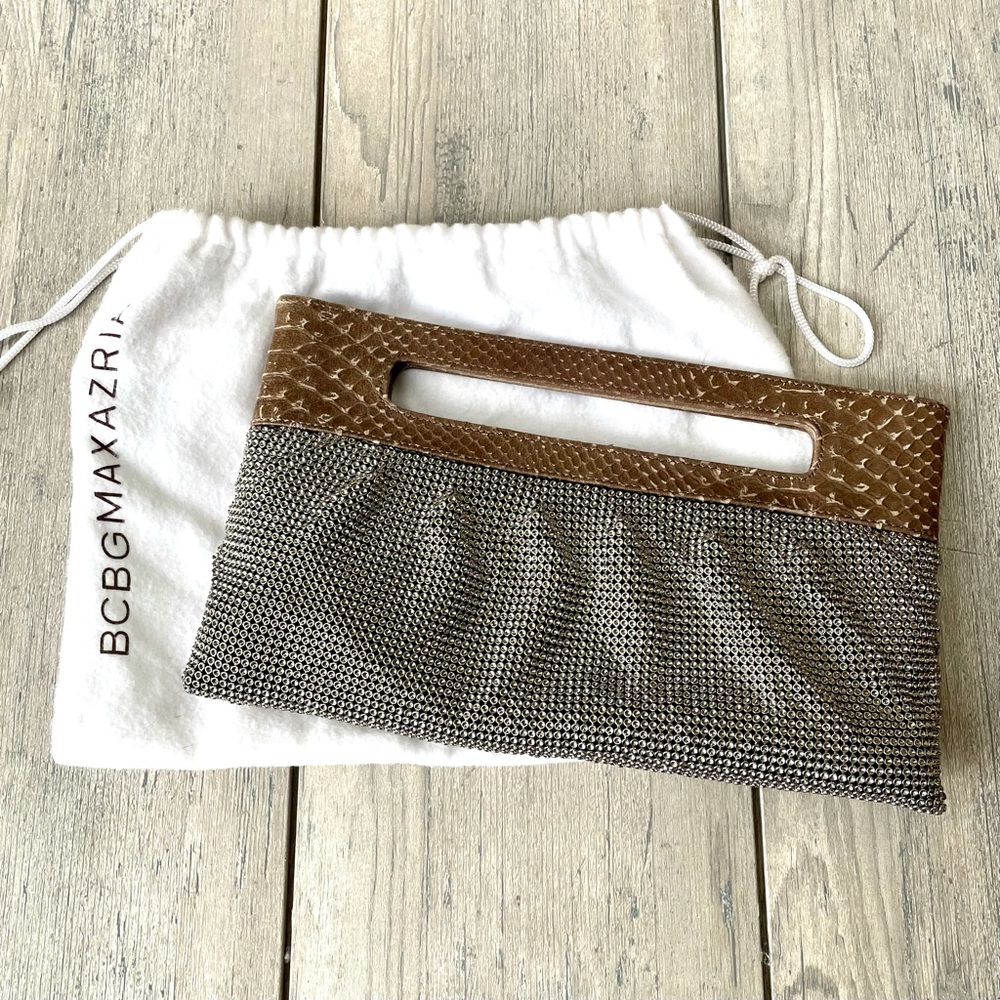 BCBG Max Azria metal mesh clutch with magnetic closure. Dust bag included